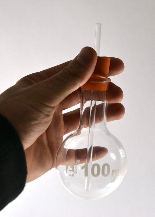 100ml round bottom flask with tube & stopper in hand